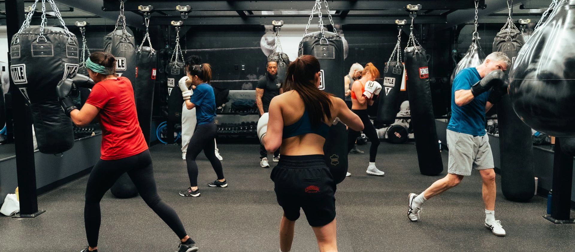 a group of people in a gym