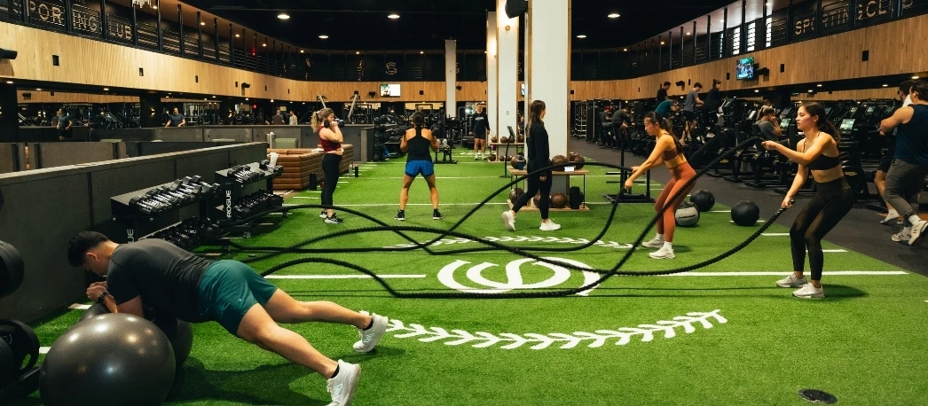 a group of people working out in a gym