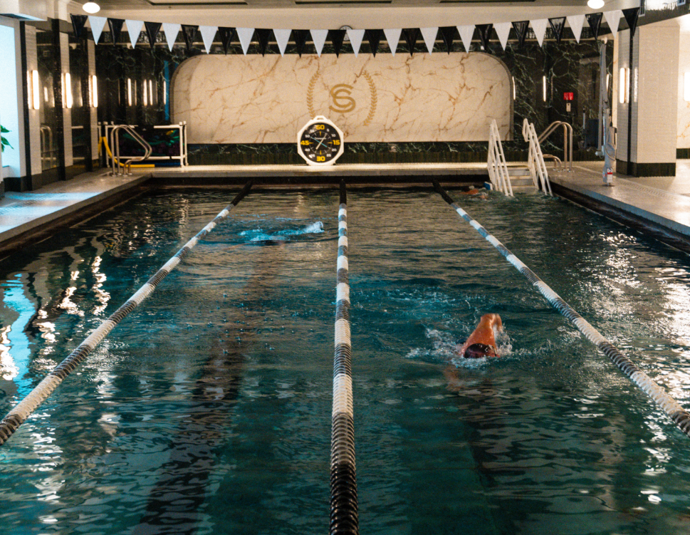 a person swimming in a pool