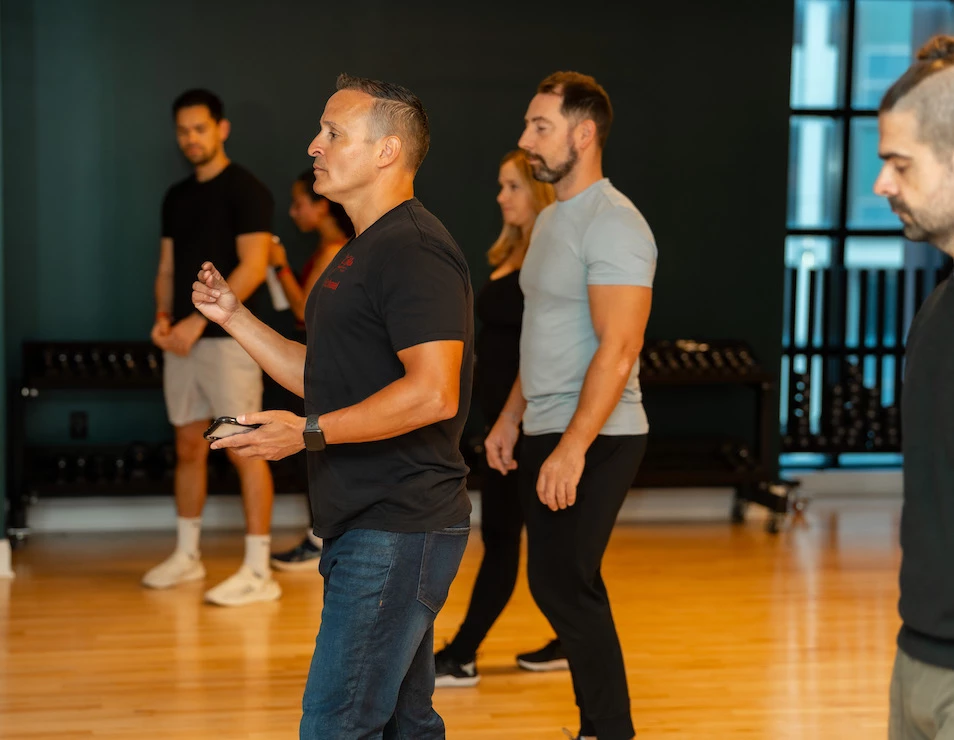 a group of people in a gym