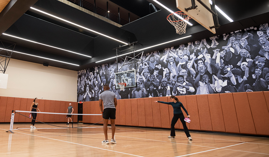 a group of people on a court