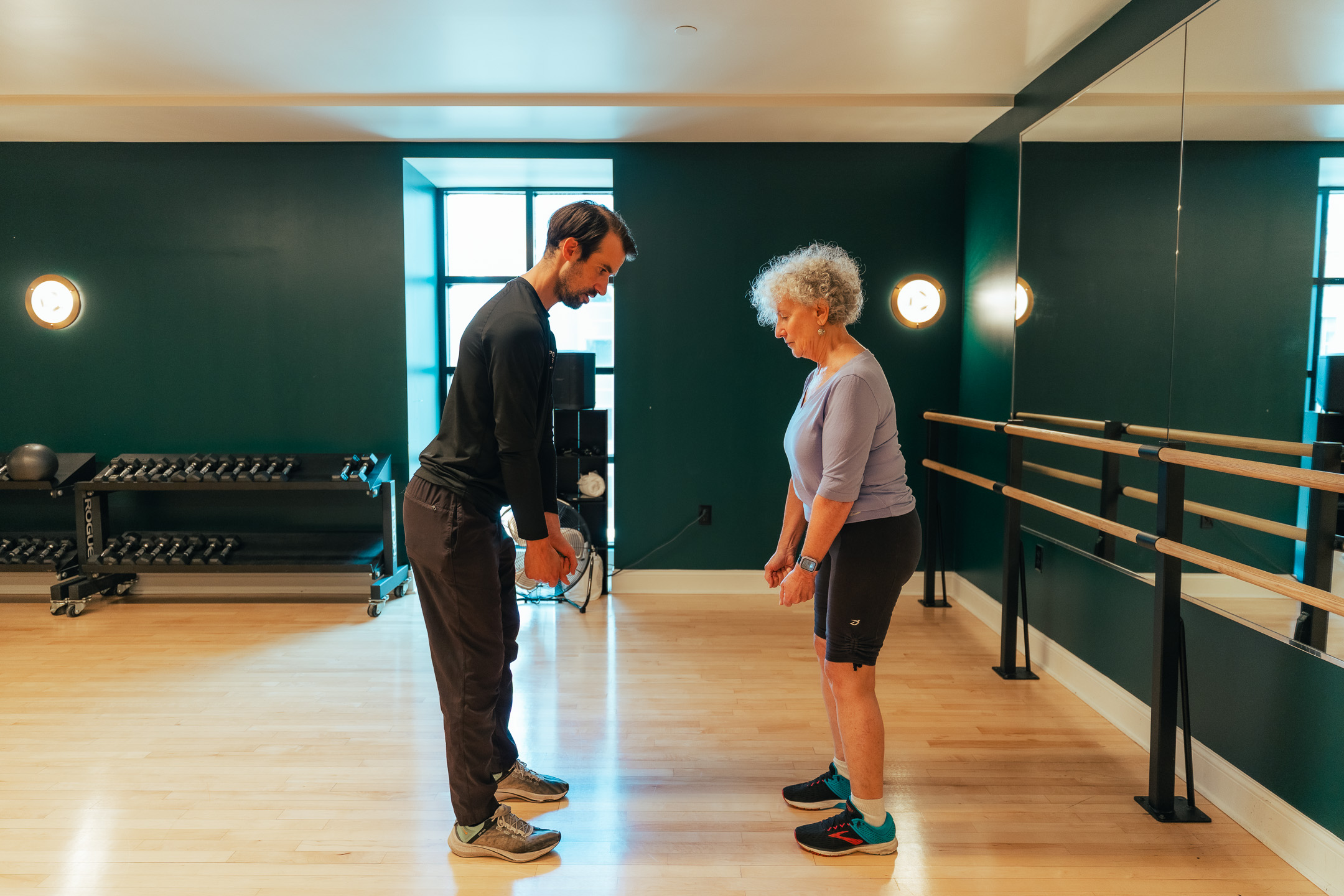 a man and woman standing in a room