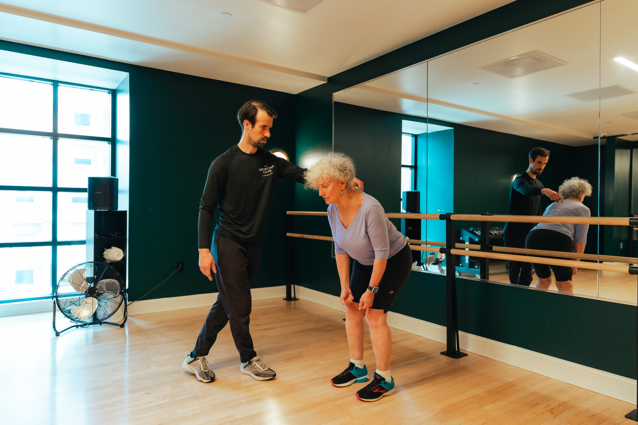 a man and woman in a gym