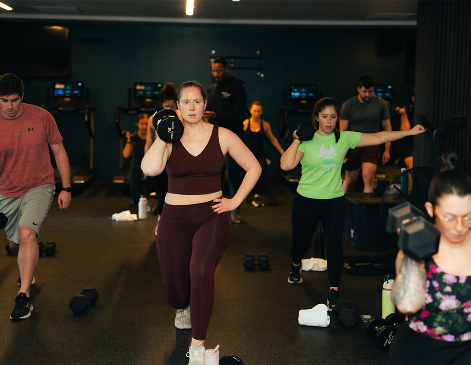 a group of people in a gym
