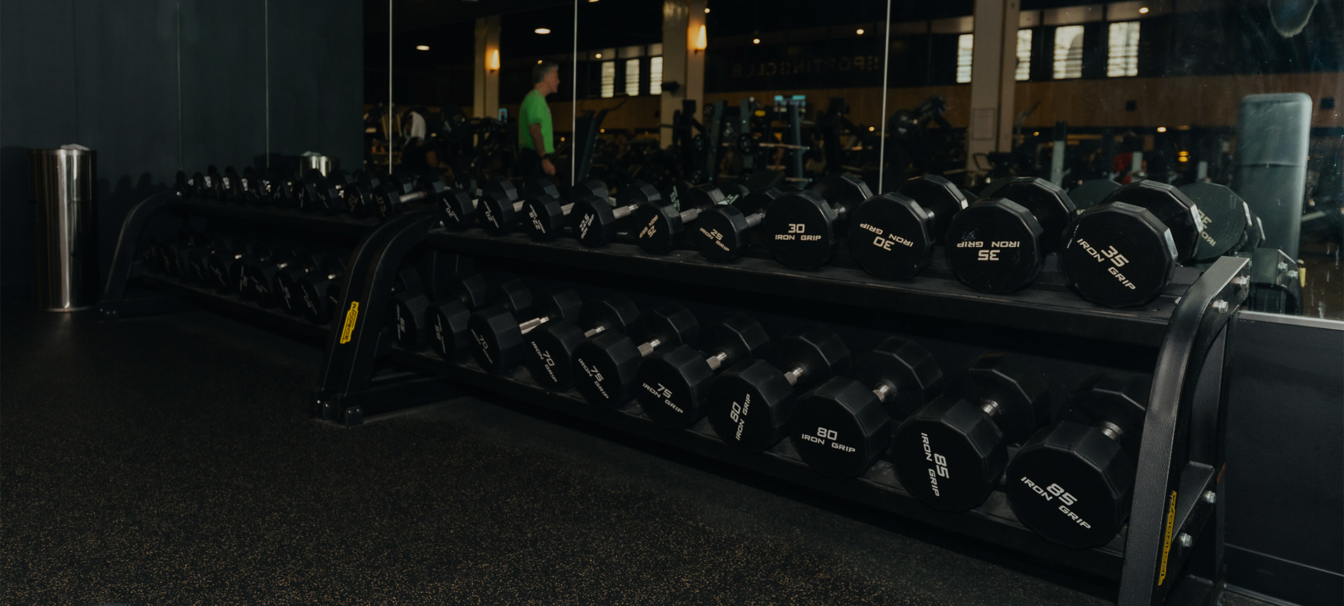 a rack of weights in a gym