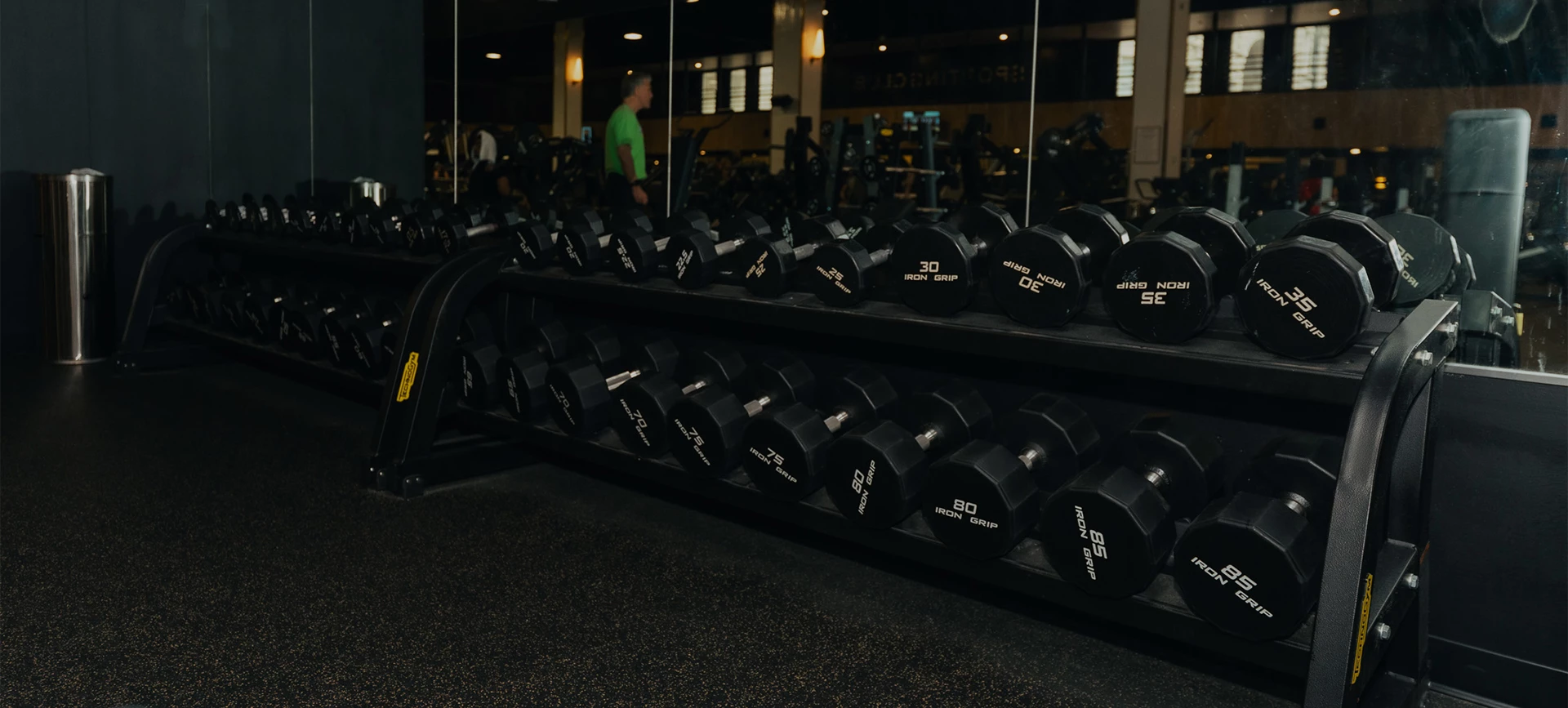 a rack of weights in a gym
