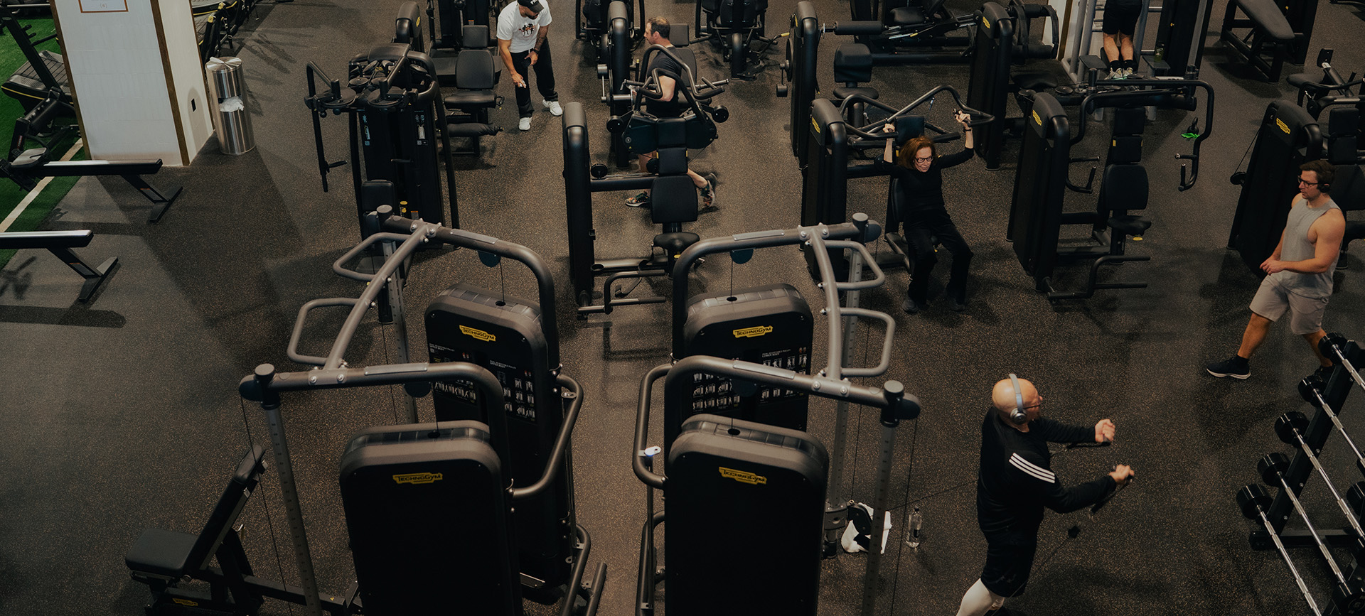 a group of people working out in a gym