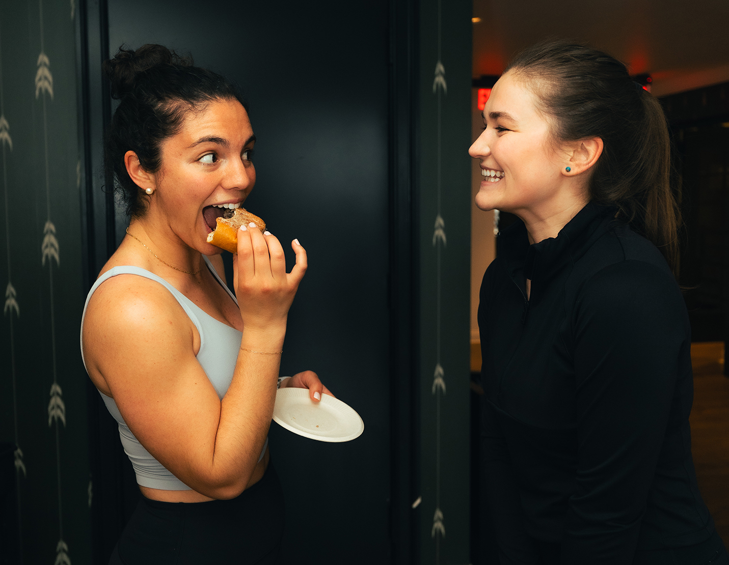 a woman eating a sandwich