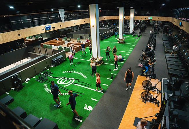 a group of people in a gym