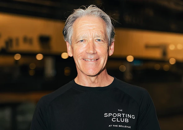 a man smiling at the camera