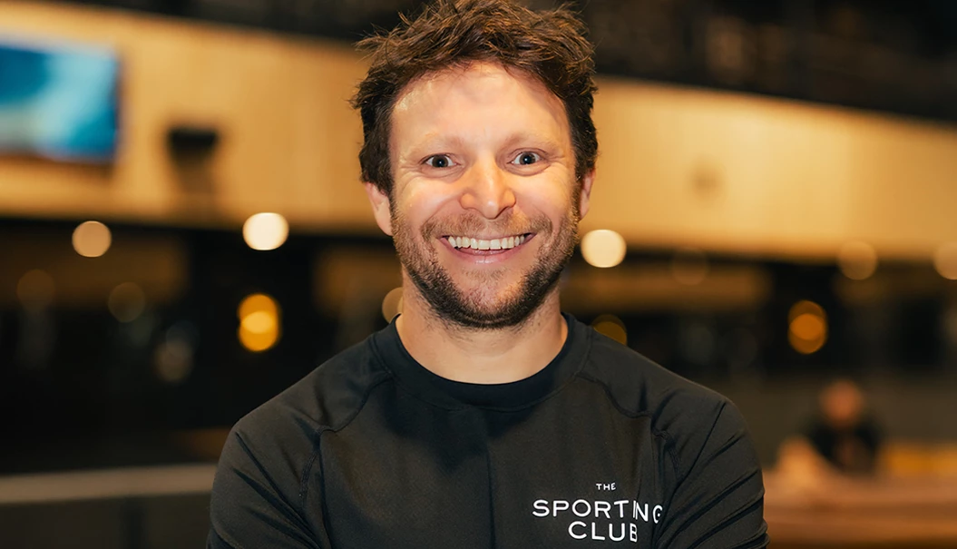 a man smiling at camera