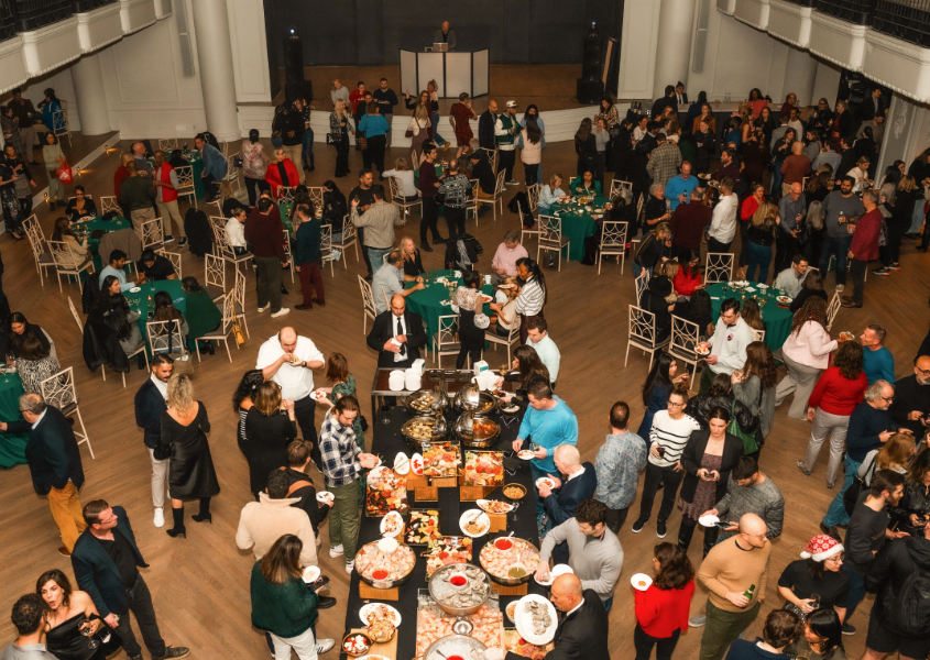 a group of people around a table