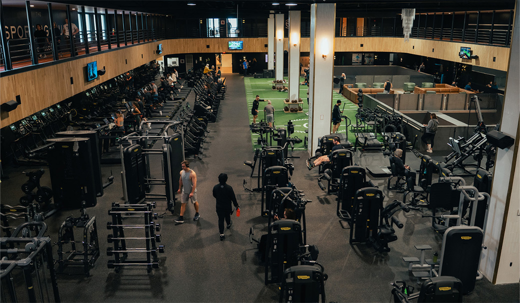 a large gym with many exercise equipment