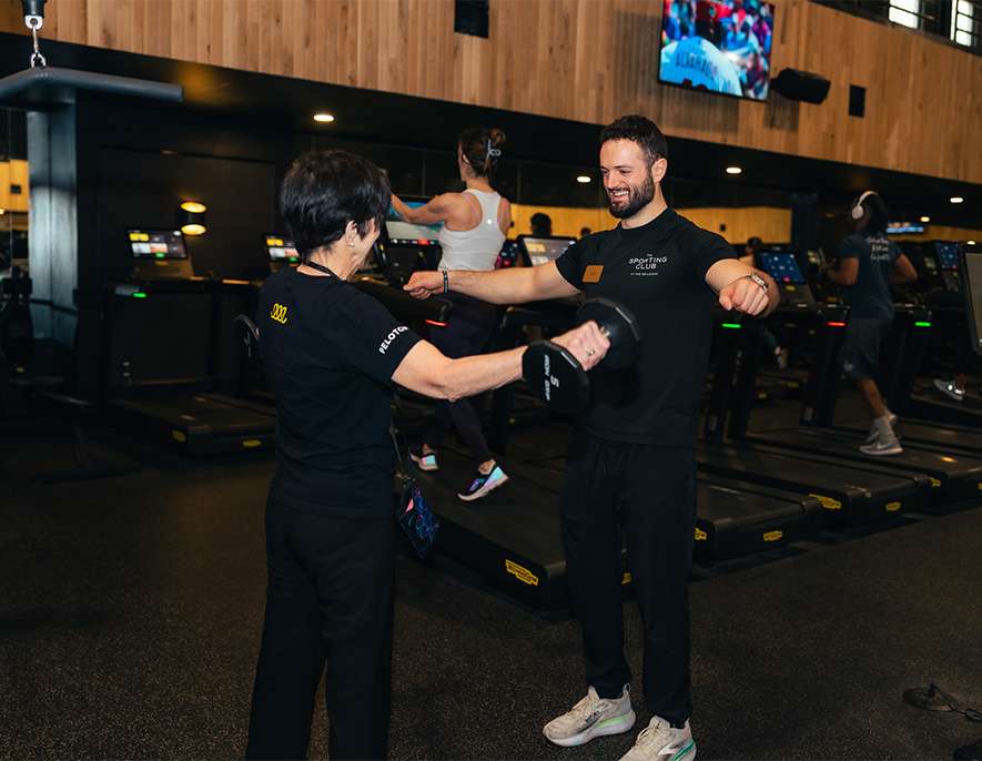 a man and woman in a gym