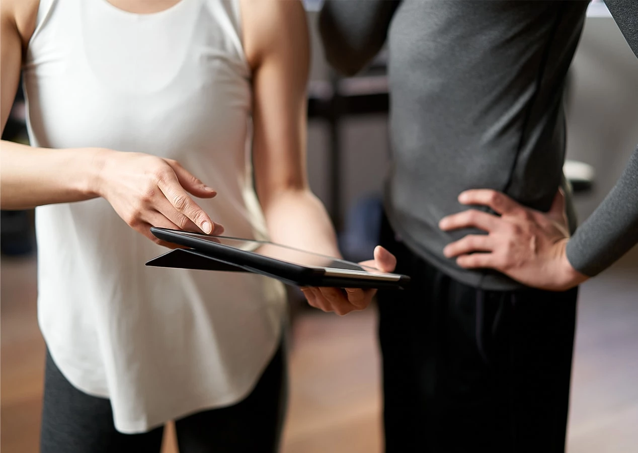a person holding a tablet