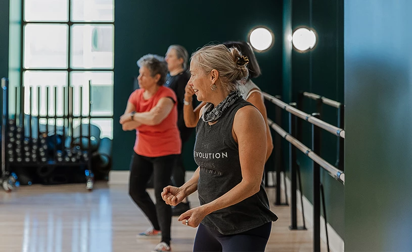 a group of women in a gym
