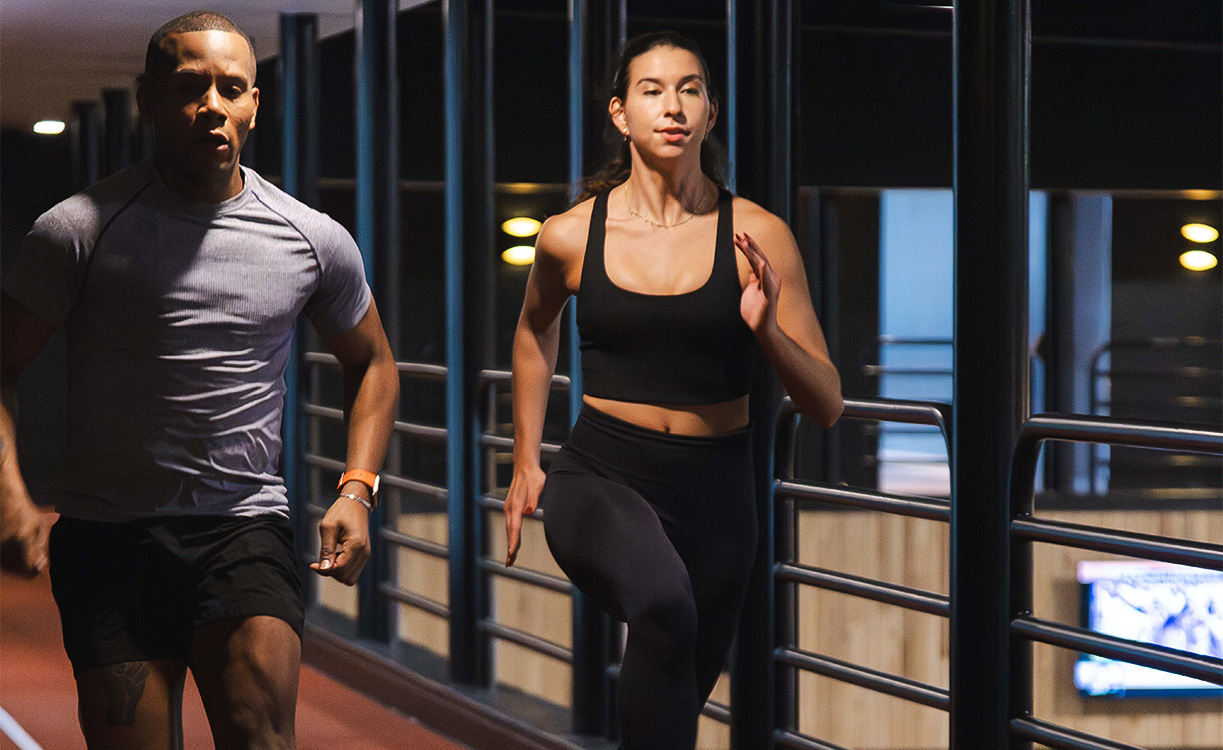 a man and woman running