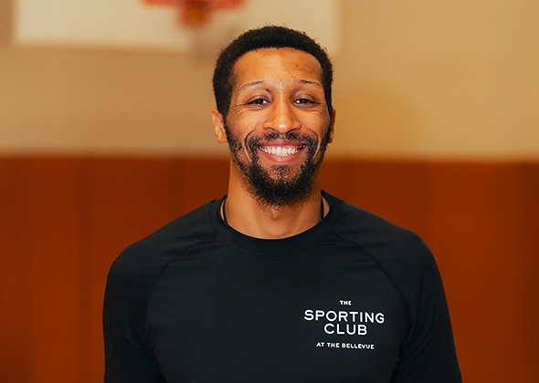 a man smiling at camera
