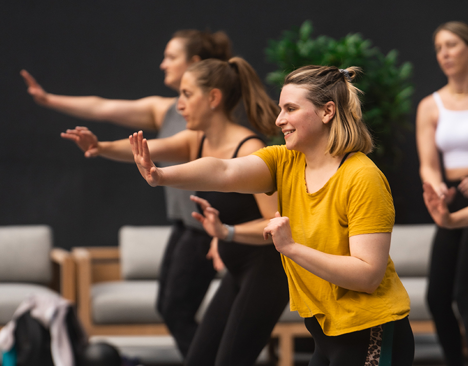 a group of women doing exercise