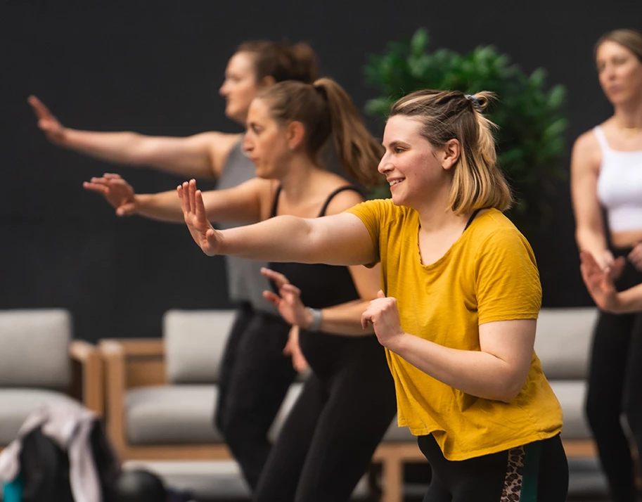 a group of women doing exercise