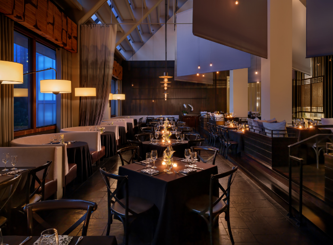 a room with tables and chairs