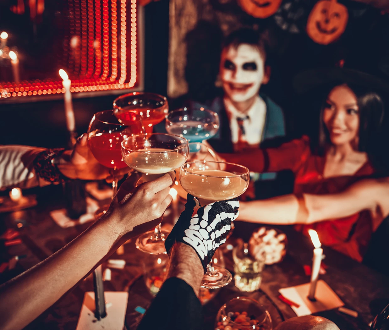 a group of people clinking glasses