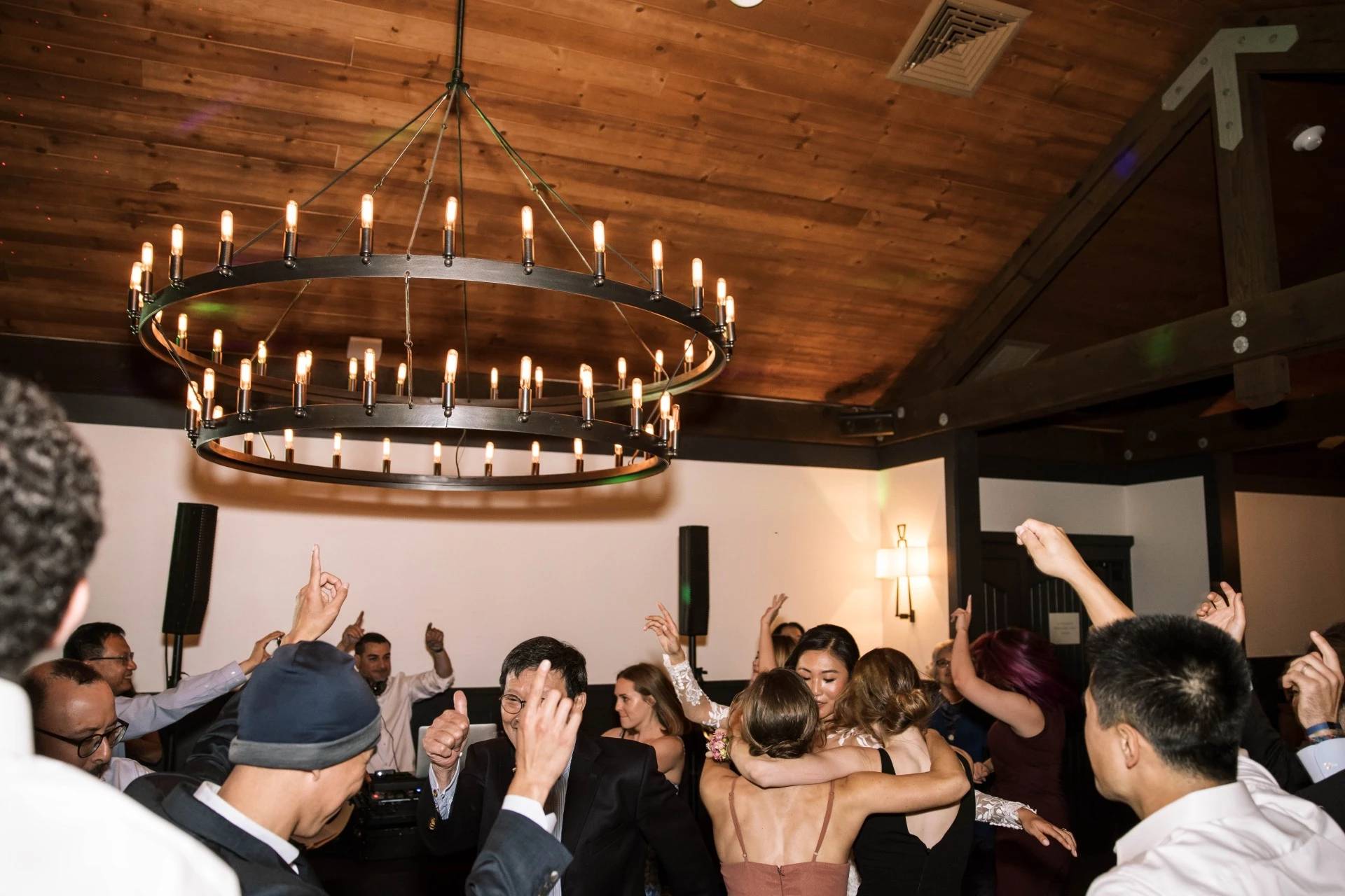 a group of people dancing in a room