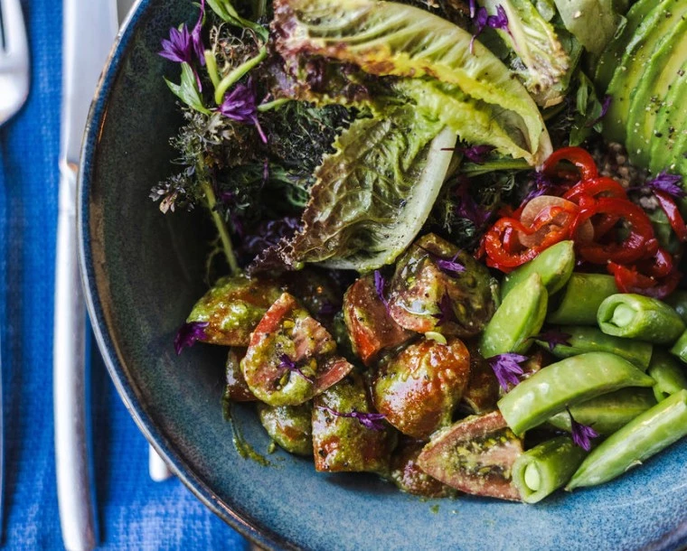 a bowl of salad with vegetables