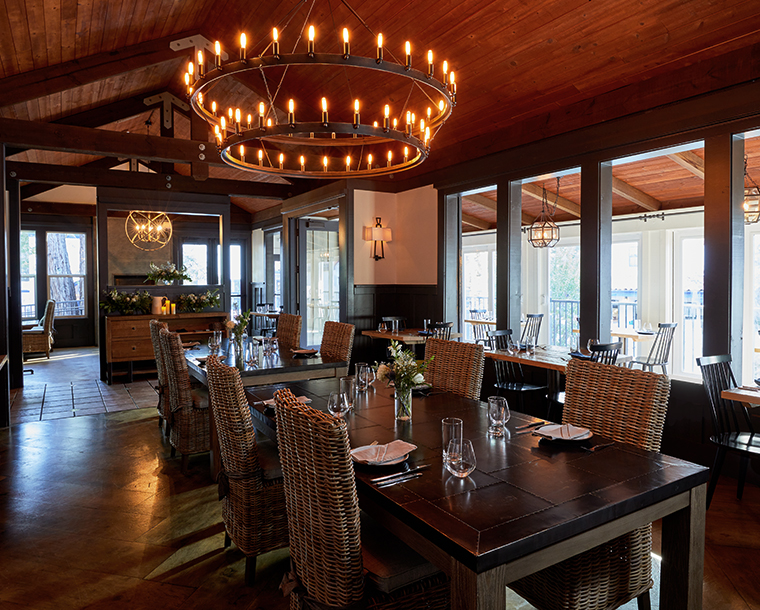 Stavrand hall with set table and light fixture