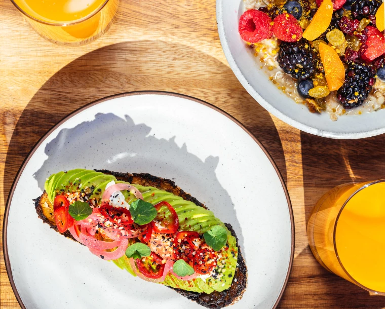 avocado toast and berry oatmeal breakfast 