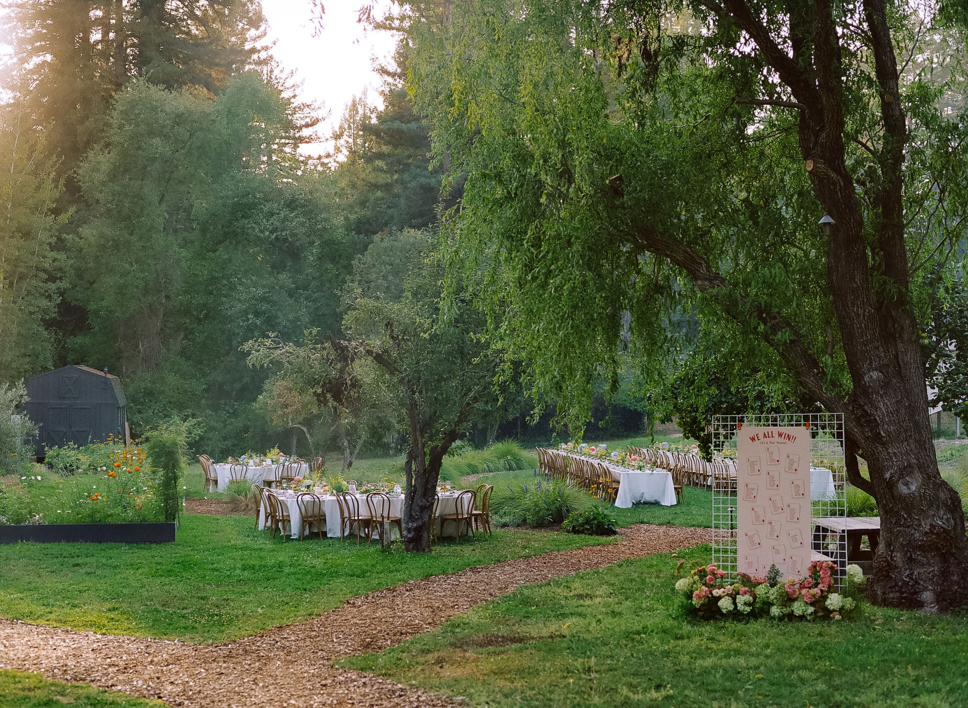 a group of tables set up in a garden