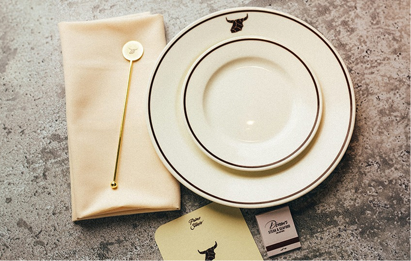 a plate and napkin next to a napkin