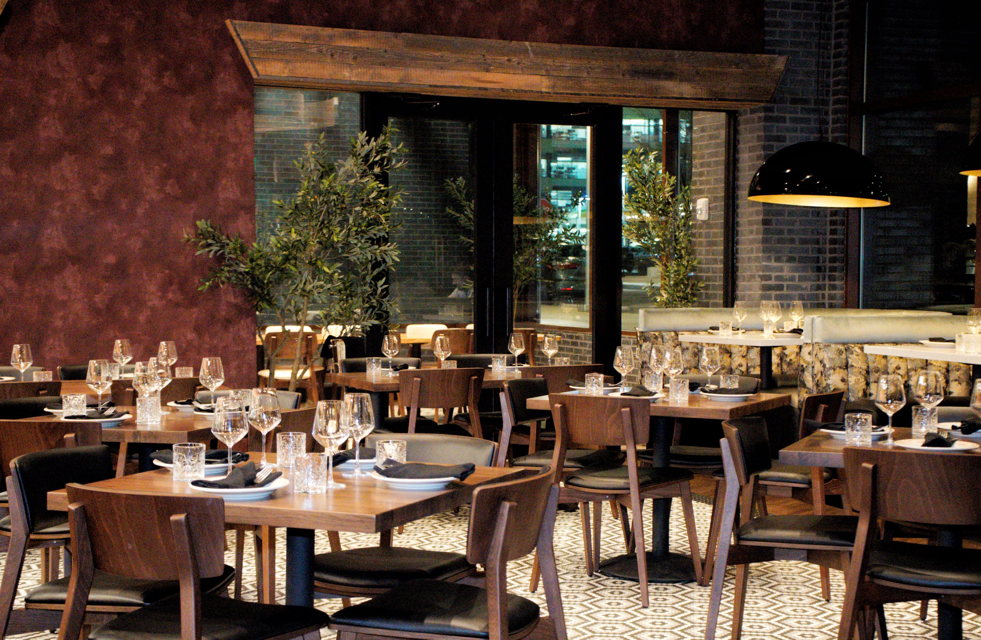 a restaurant with tables and chairs
