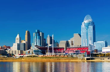 event venue on the water with buildings in the back