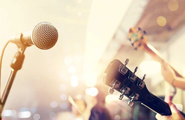 Close up of person playing guitar