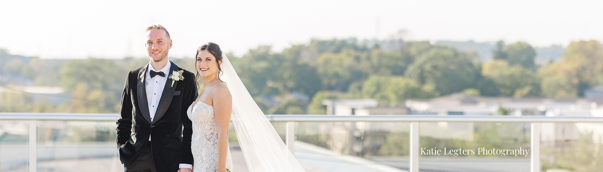 a woman in a white dress with a long veil