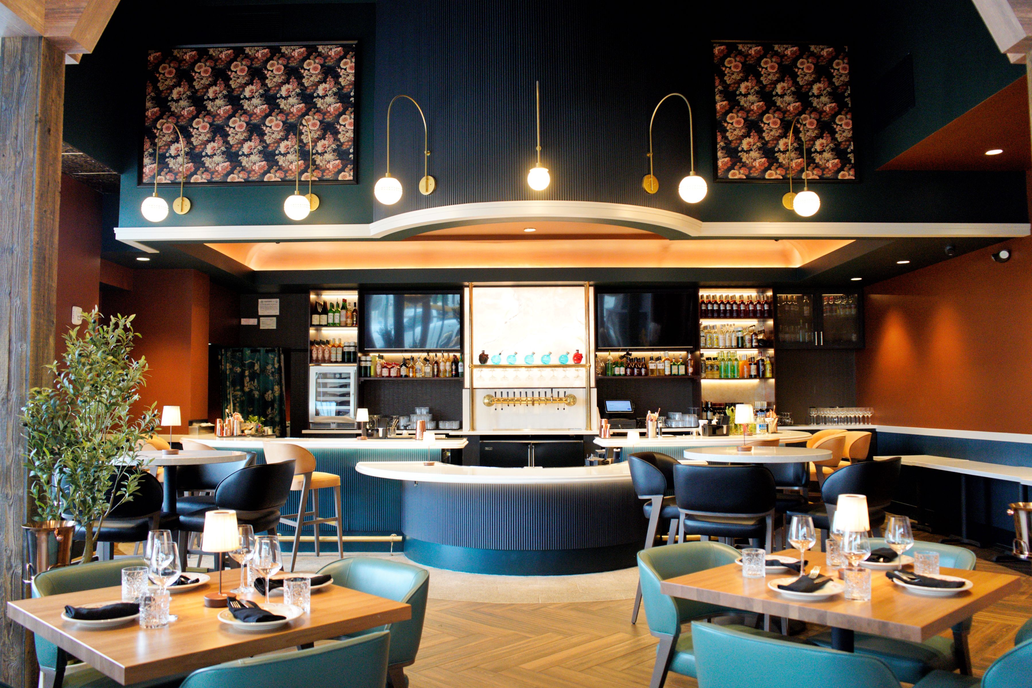 a restaurant with tables and chairs
