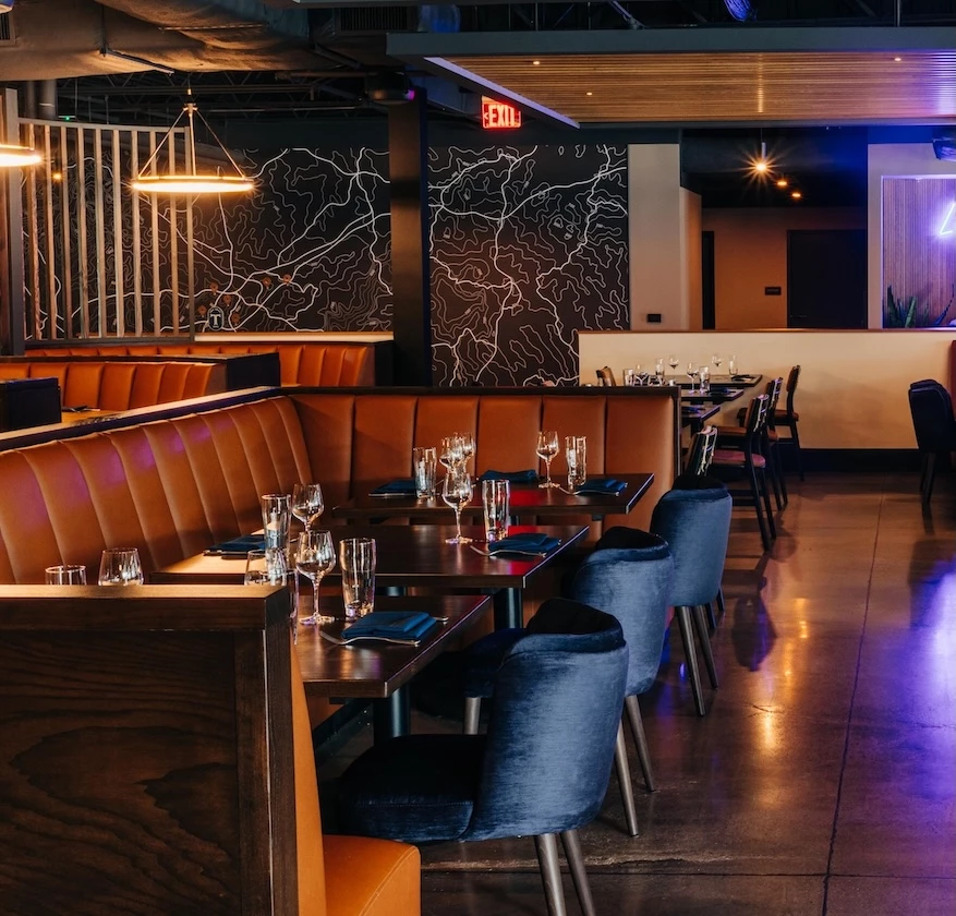 a restaurant with tables and chairs