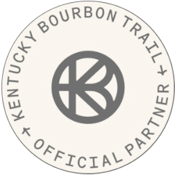 a white circle with black text and a logo