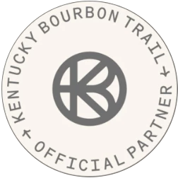 a white circle with black text and a logo