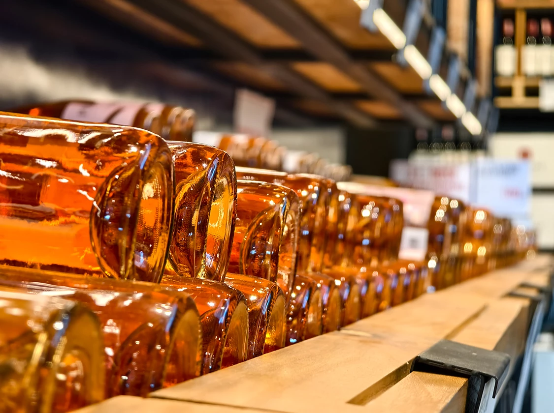 a group of bottles on a shelf