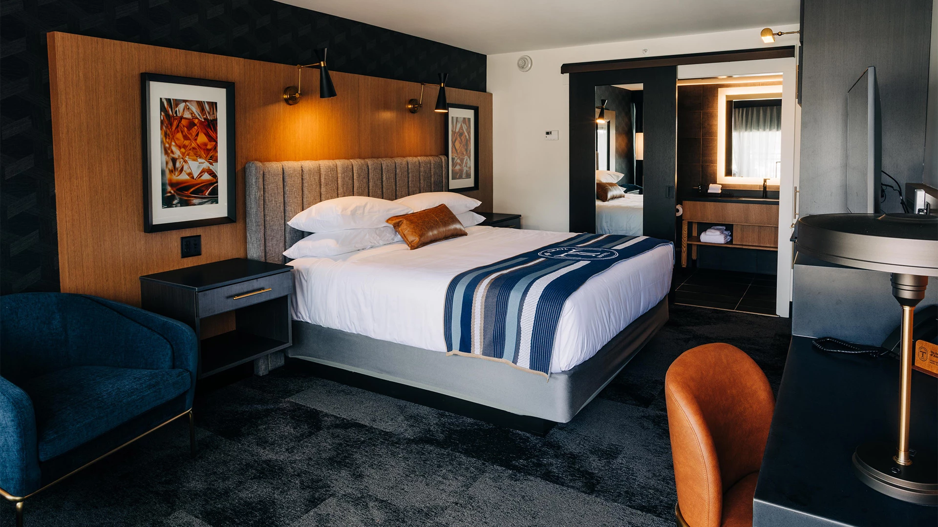 a room with a bed and a chair