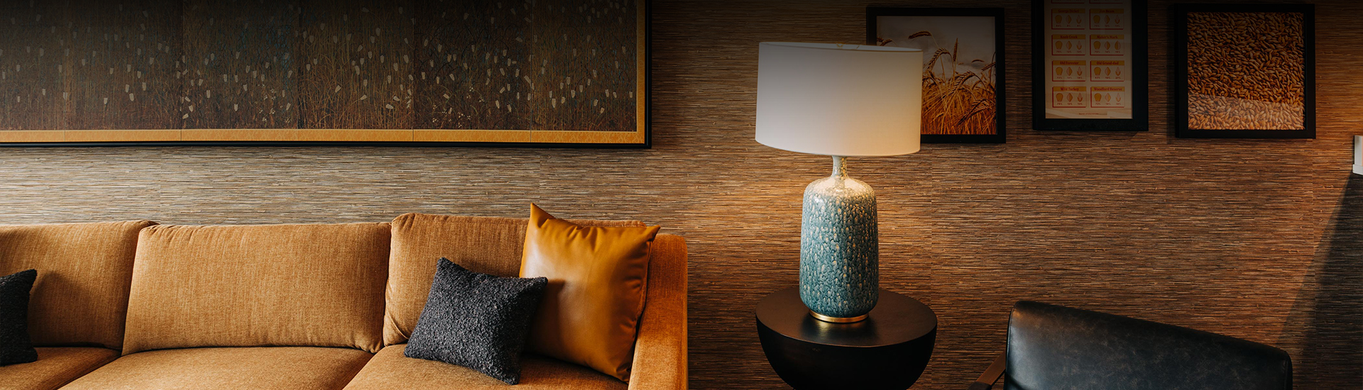 a lamp on a table next to a couch