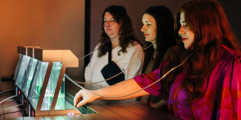 a group of women sitting at a table