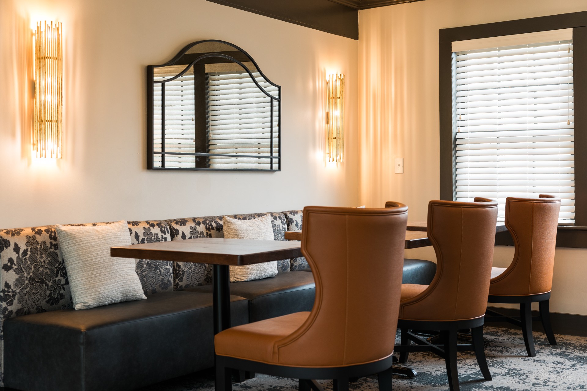 a room with a table and chairs