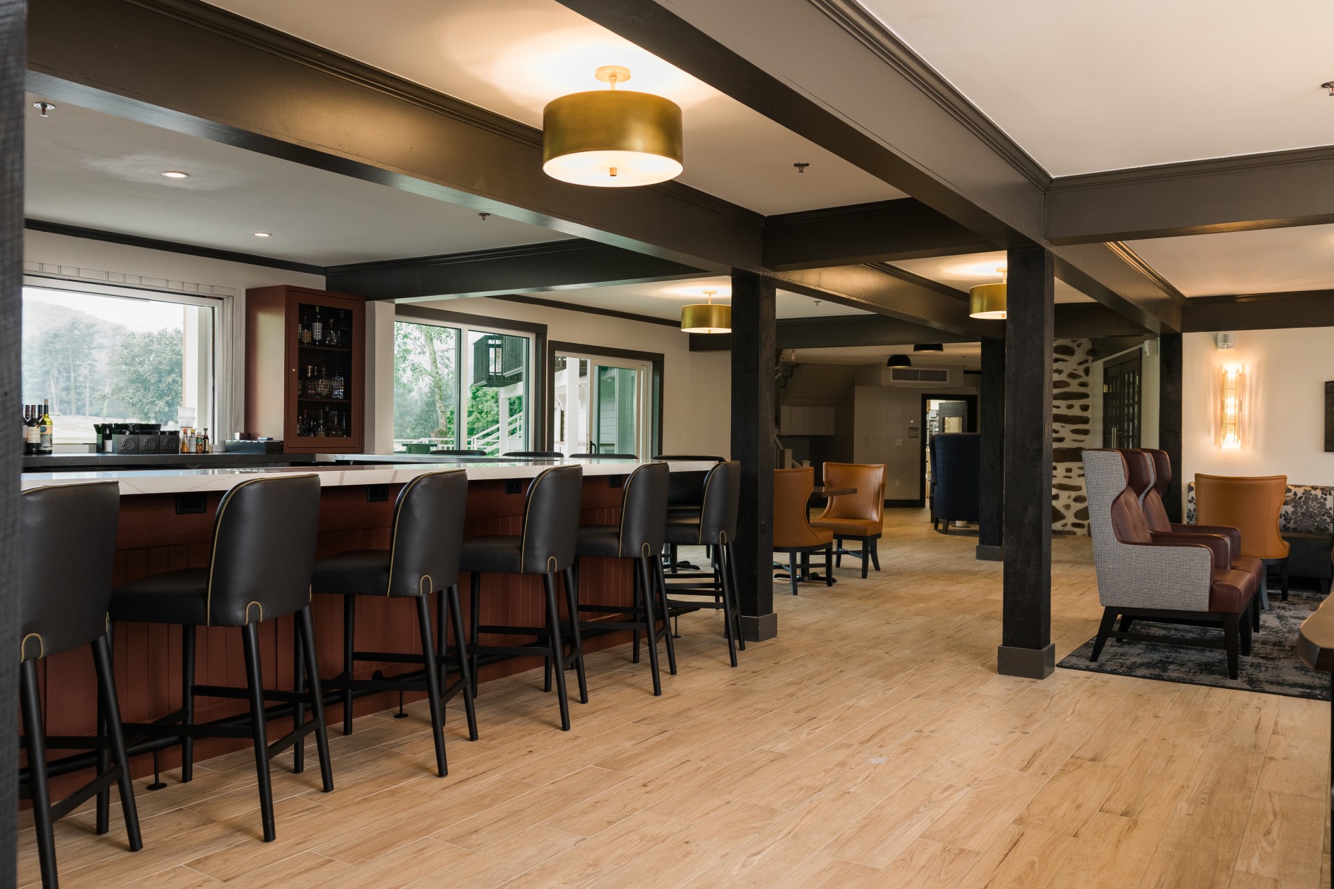 a bar with chairs and a table
