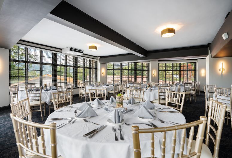 a room with tables and chairs