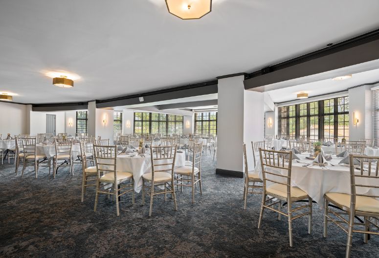 a room with tables and chairs