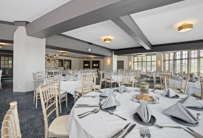 a room with tables and chairs