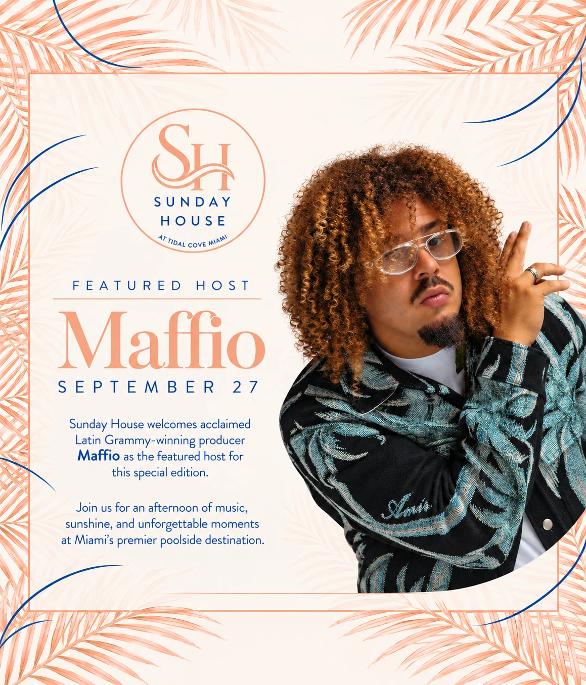 a man with curly hair and glasses